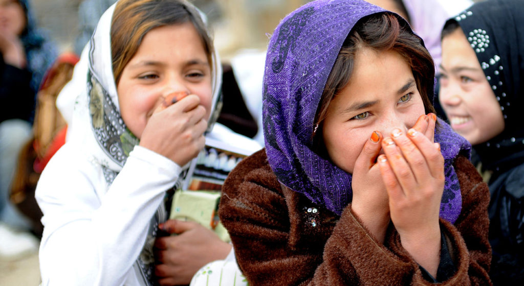 Afghan girls from Ghazni province laughing